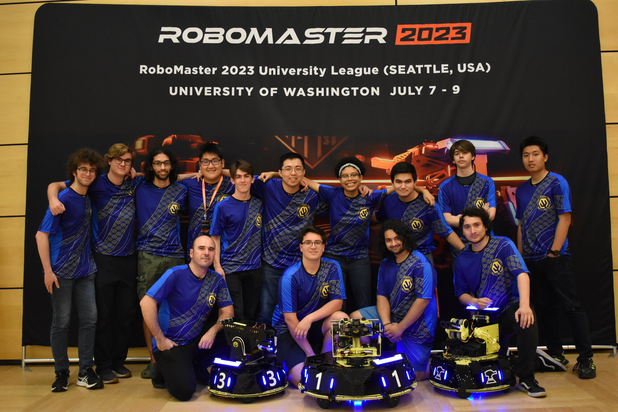 Triton Robotics members wearing team jerseys at the University of Washington