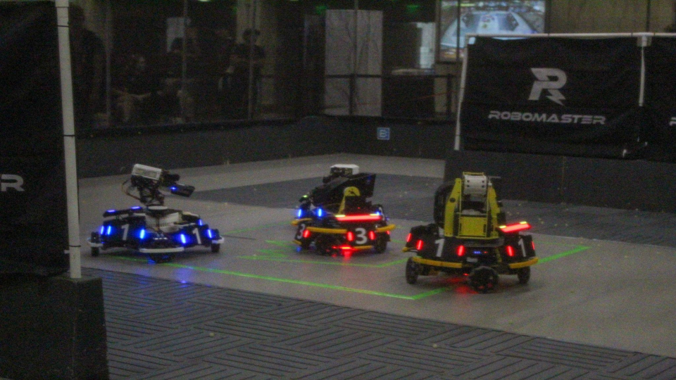 Triton Robotics robots competing on the arena floor