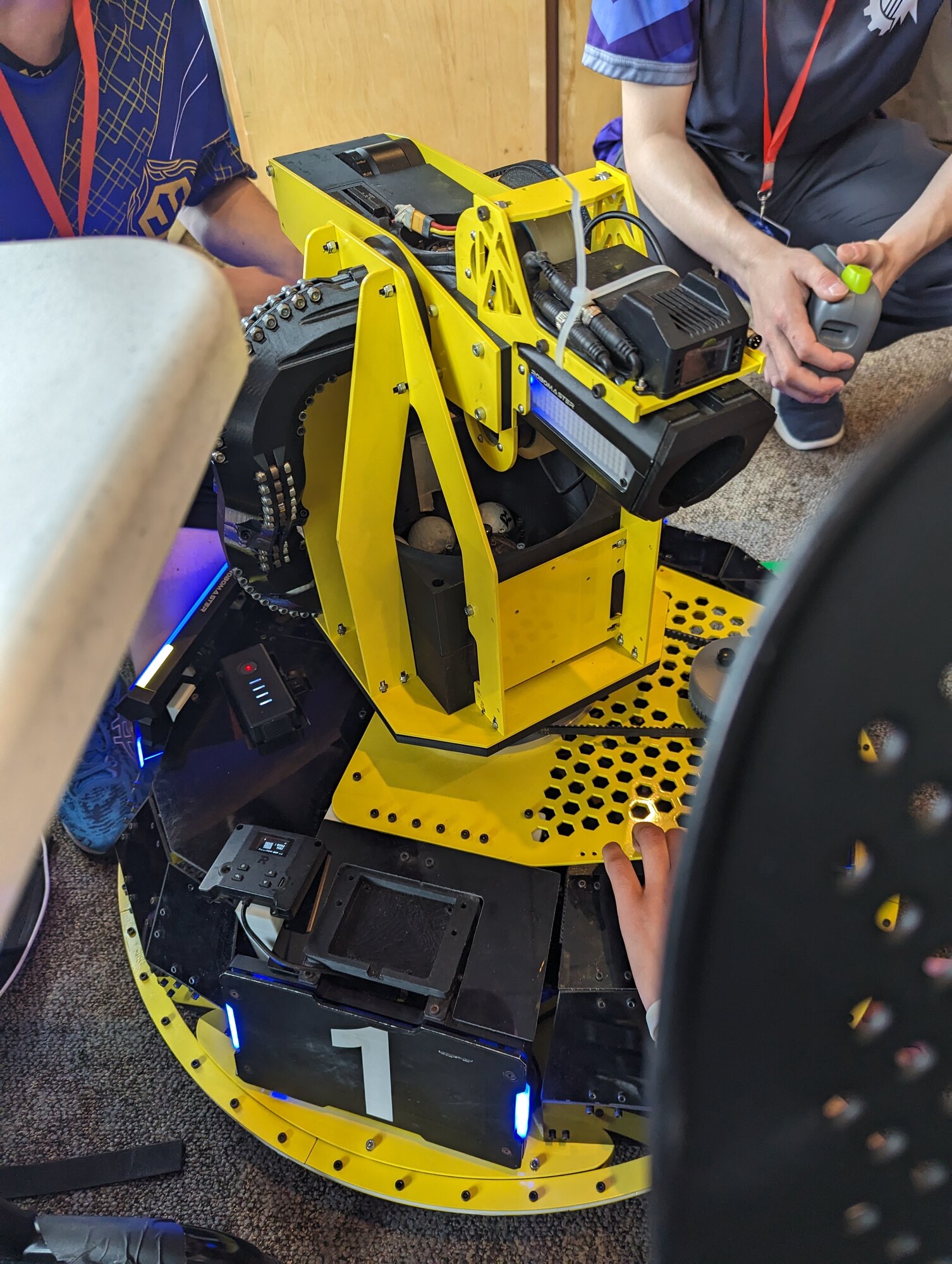 A Triton Robotics member working on the mechanical and electronic systems of a robot